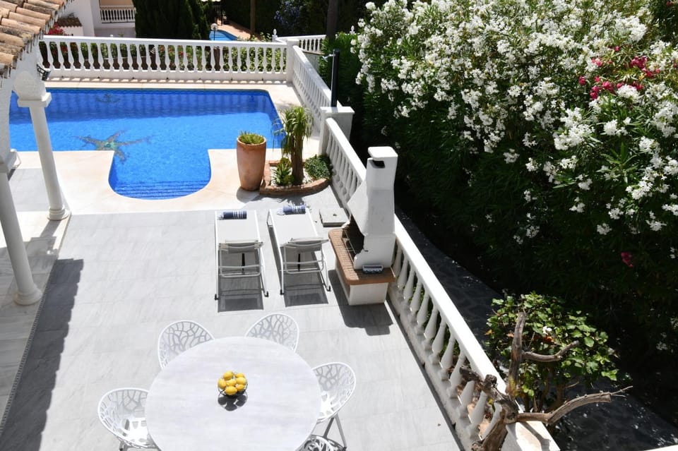Property building, Living room, Swimming pool