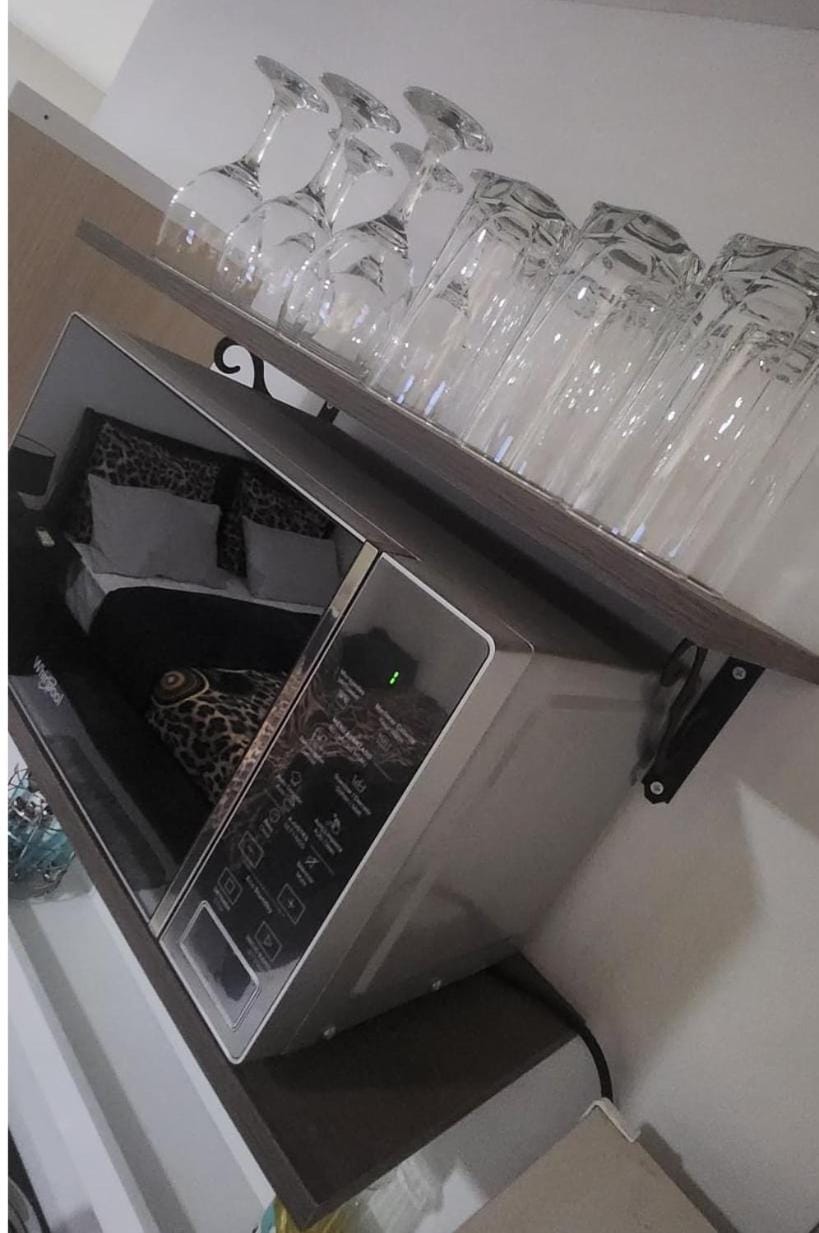 Kitchen or kitchenette, microwave