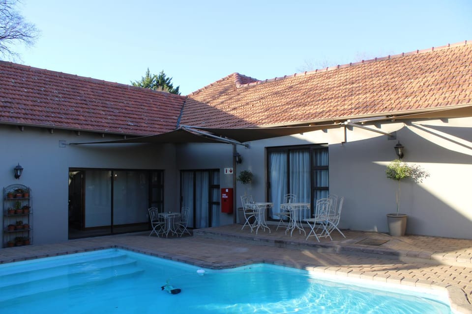 Property building, Patio, Swimming pool