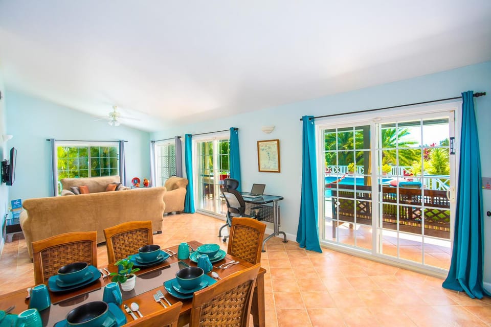 Living room, Seating area, Dining area, Pool view, Swimming pool