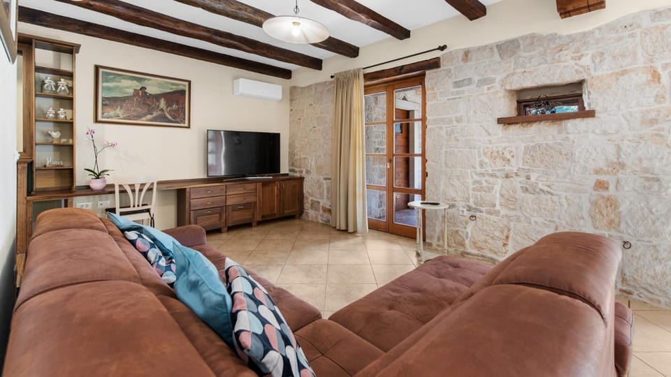 Property building, Living room, Seating area, air conditioner