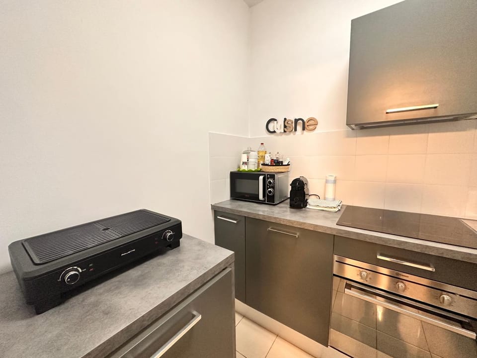 Kitchen or kitchenette, oven, stove, toaster