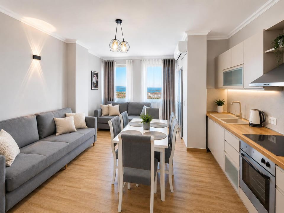 Kitchen or kitchenette, Living room, Seating area, Dining area