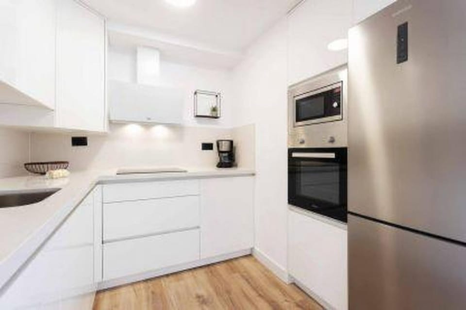 Kitchen or kitchenette, oven, stove