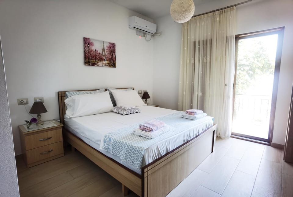 Bed, Photo of the whole room, Bedroom, towels, air conditioner