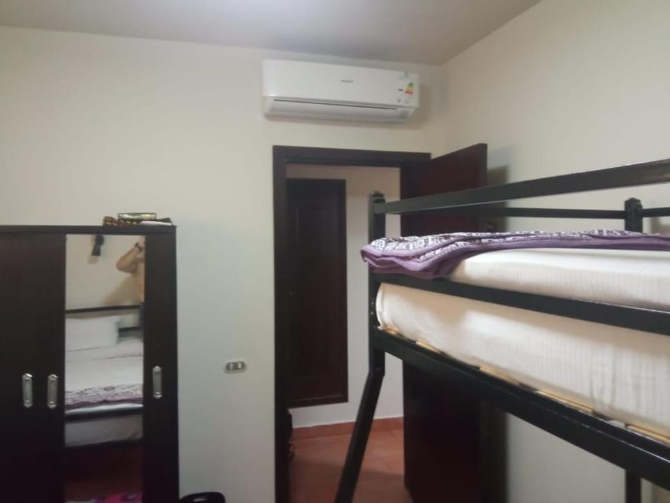 bunk bed, wardrobe, air conditioner