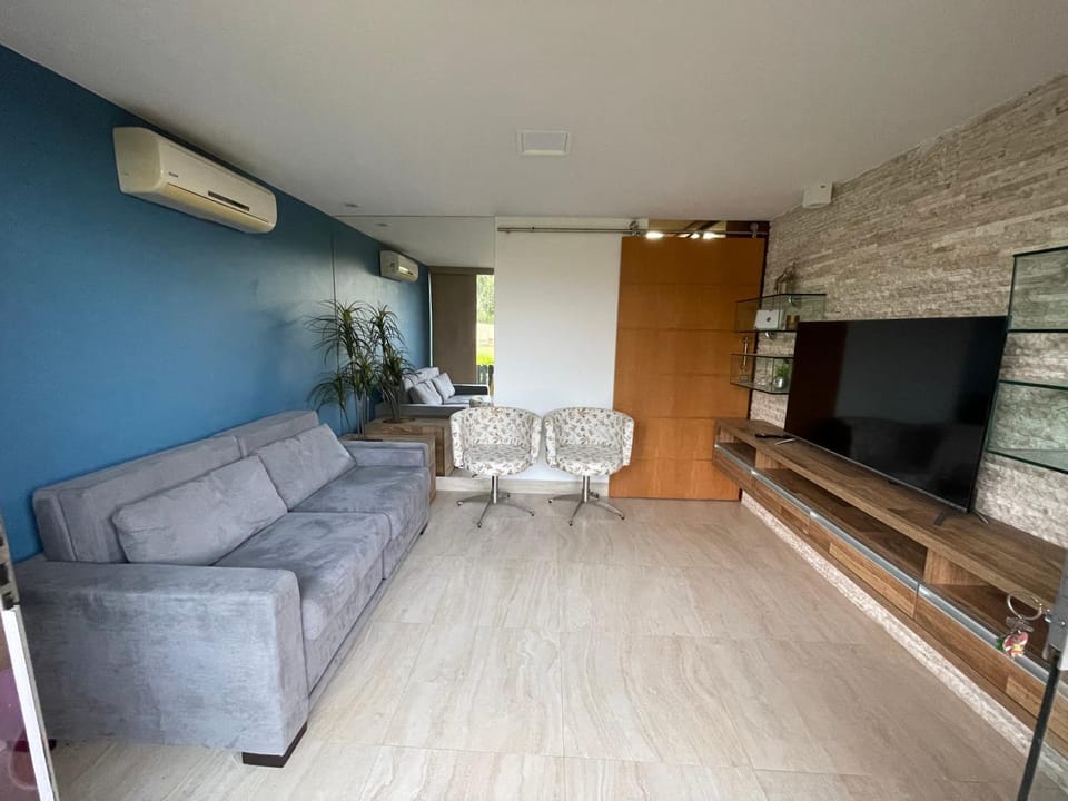 Communal lounge/ TV room, TV and multimedia, Living room, Seating area, air conditioner
