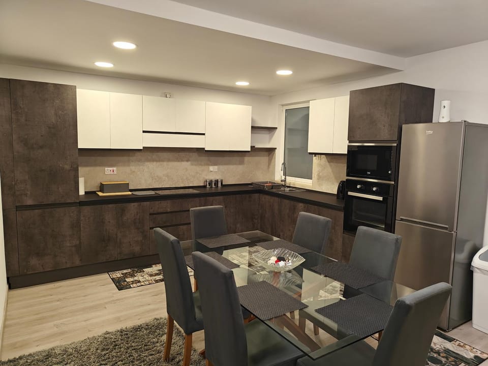 Dining area, dishwasher, microwave, oven, stove, kitchen