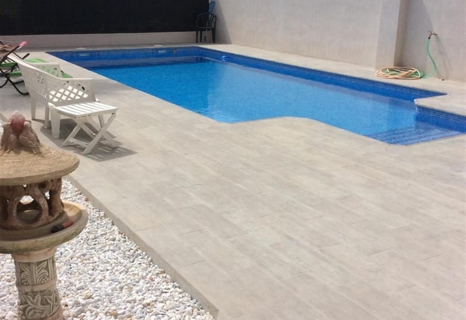 Property building, Living room, Swimming pool