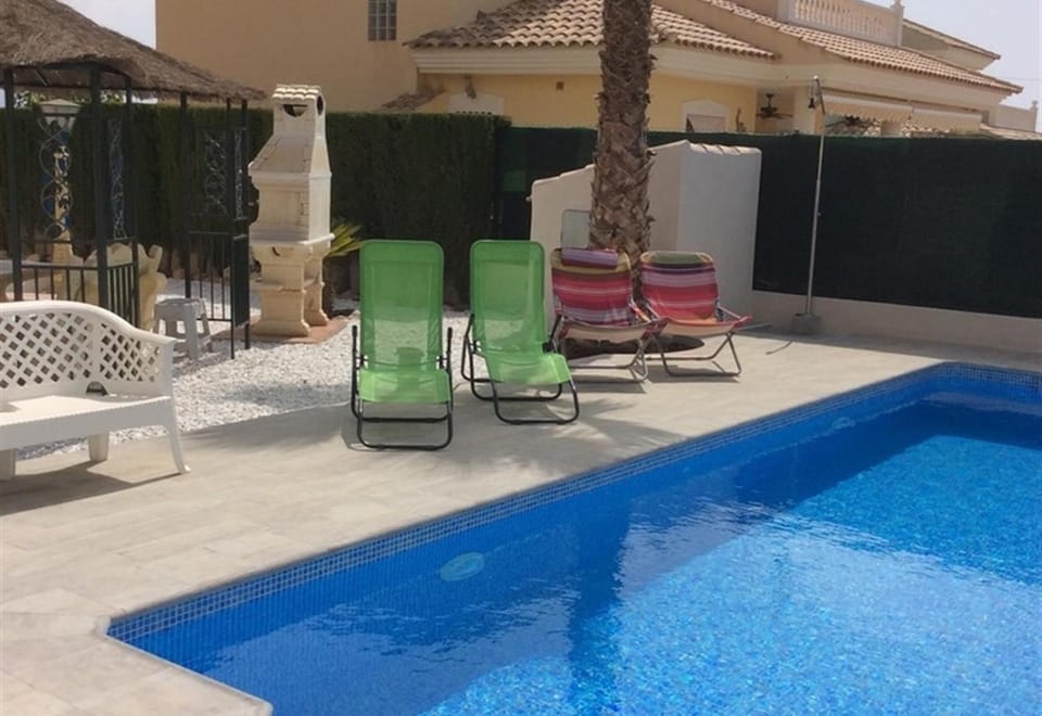 Property building, Living room, Swimming pool