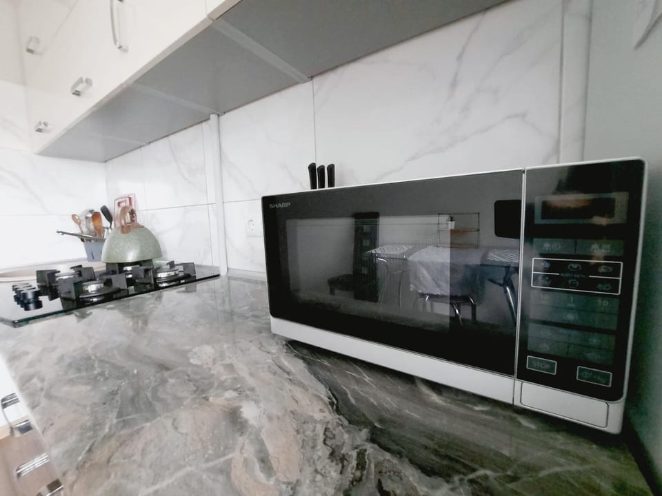 Kitchen or kitchenette, oven, stove