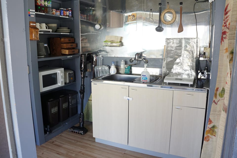 microwave, minibar, stove, kitchen