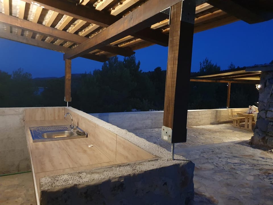 Robinson House in Tisno