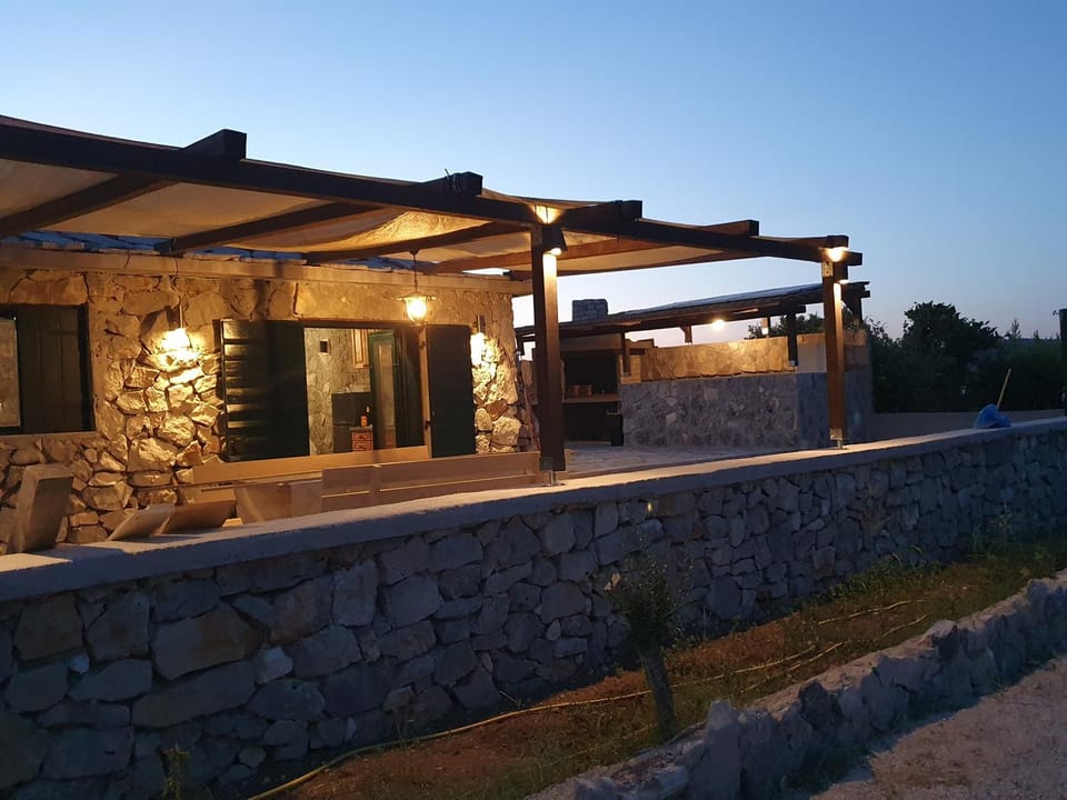 Robinson House in Tisno