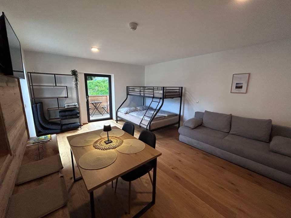 Bed, TV and multimedia, Living room, Photo of the whole room, Seating area, Dining area, Bedroom