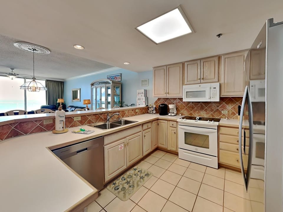 Kitchen or kitchenette, dishwasher, microwave, oven, stove, kitchen