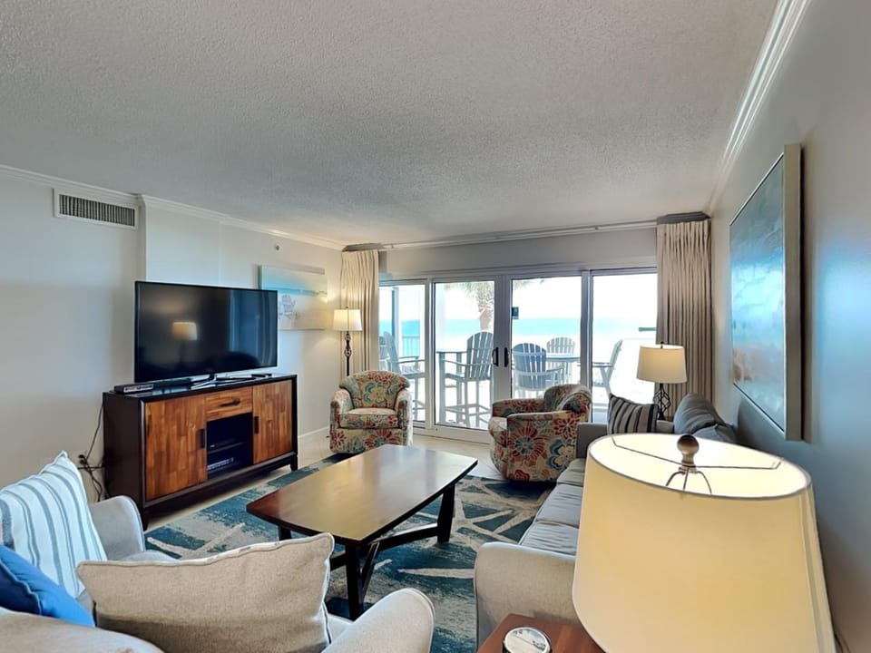 TV and multimedia, Living room, Seating area, Sea view, furniture, air conditioner