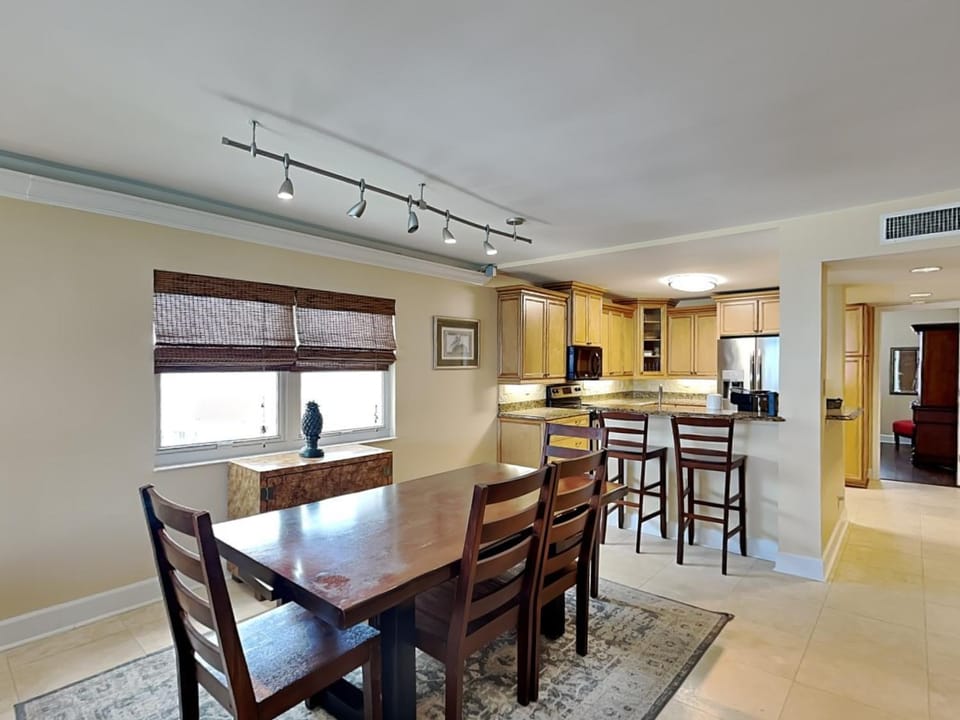 Kitchen or kitchenette, Dining area, furniture, microwave, air conditioner