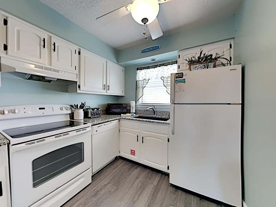 Kitchen or kitchenette, microwave, oven, stove, kitchen