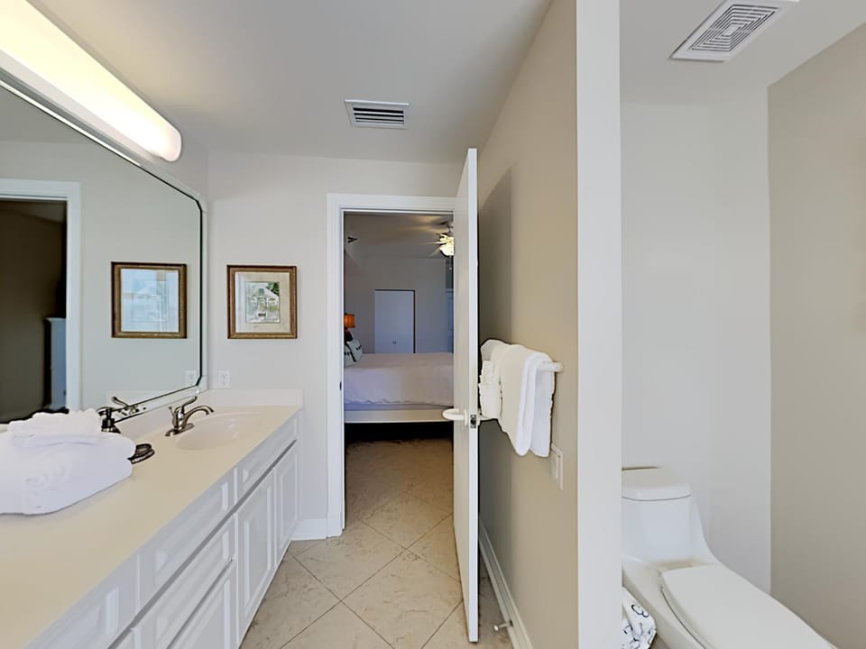 Toilet, Bathroom, towels, air conditioner