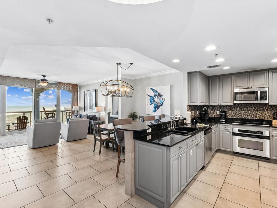 View (from property/room), Balcony/Terrace, Kitchen or kitchenette, Living room, Seating area, Dining area, Sea view, furniture, microwave, oven, stove
