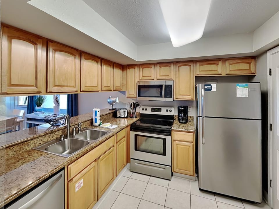 Kitchen or kitchenette, microwave, oven, stove, kitchen