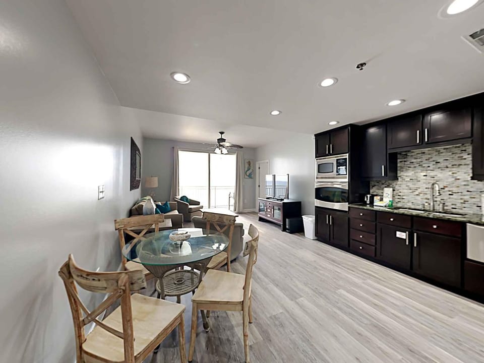TV and multimedia, Balcony/Terrace, Kitchen or kitchenette, Living room, Seating area, Dining area, dishwasher, furniture, microwave, oven, stove, kitchen