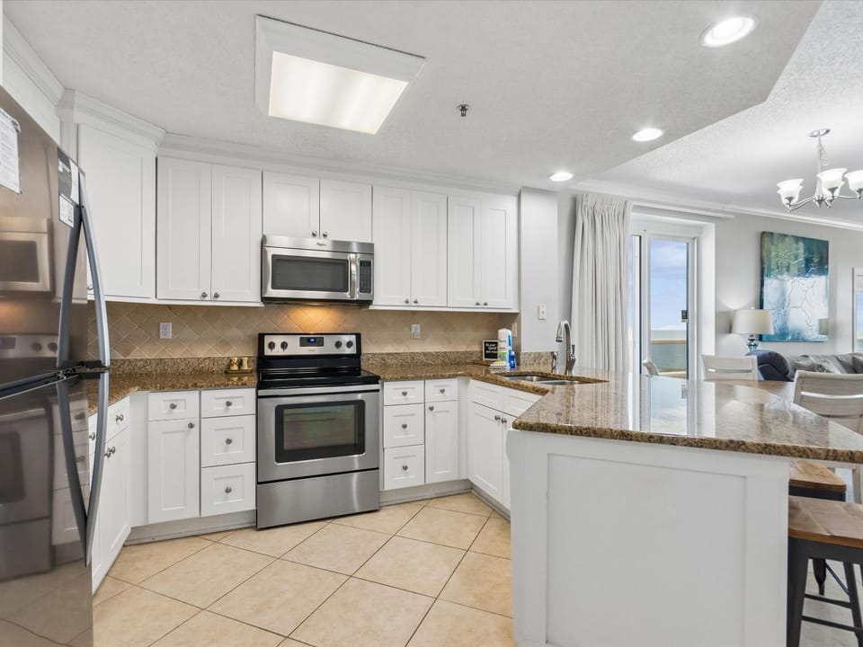 Kitchen or kitchenette, Living room, Seating area, Sea view, furniture, microwave, oven, stove, kitchen