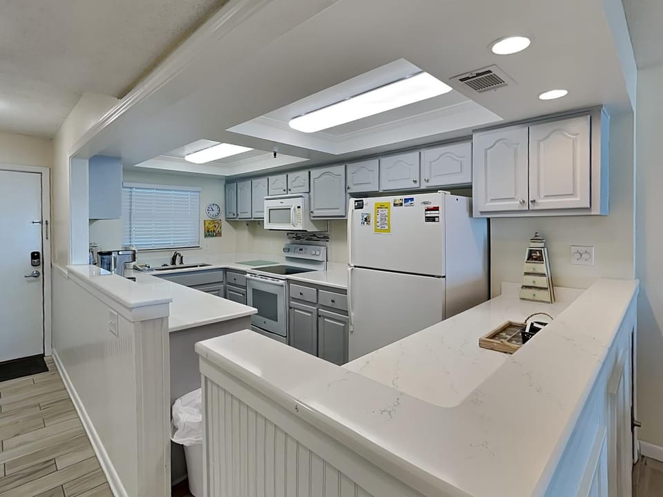 Kitchen or kitchenette, microwave, oven, stove, kitchen