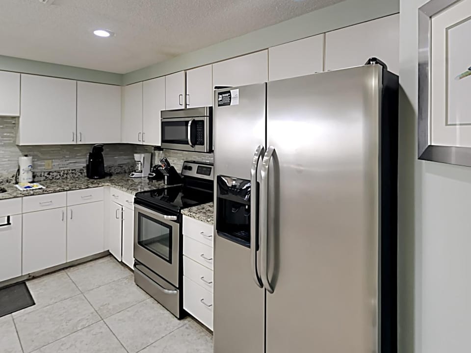 Kitchen or kitchenette, microwave, oven, stove, kitchen