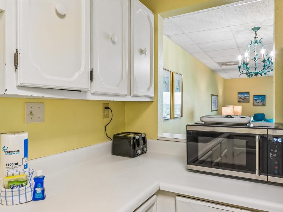 Kitchen or kitchenette, microwave, toaster
