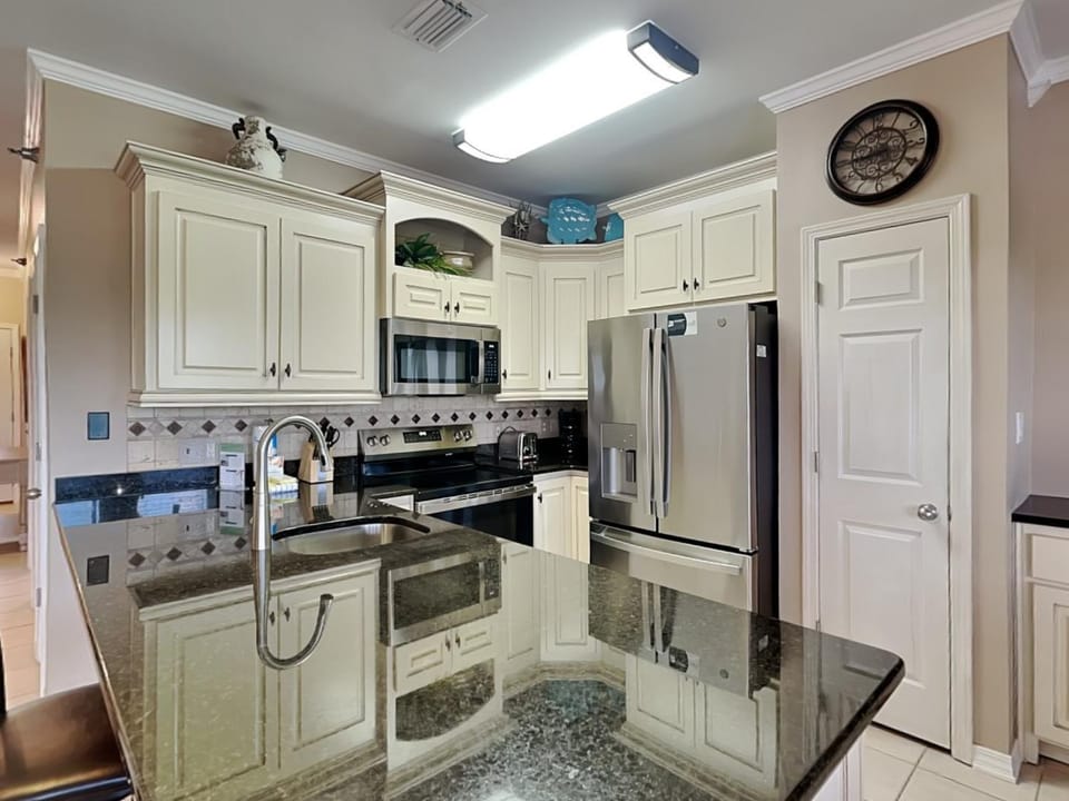 Kitchen or kitchenette, microwave, oven, stove, kitchen