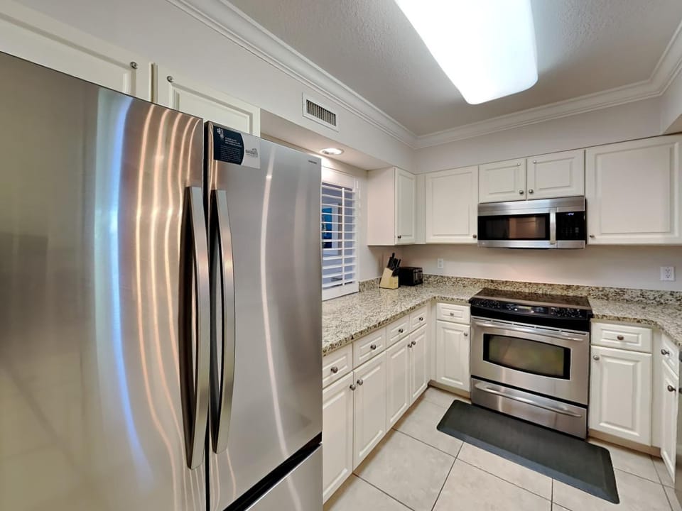 Kitchen or kitchenette, microwave, oven, stove, kitchen