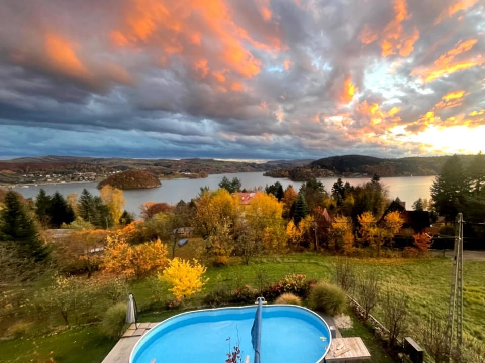 Nearby landmark, Day, Natural landscape, Lake view, Mountain view, Pool view, Swimming pool, Sunset