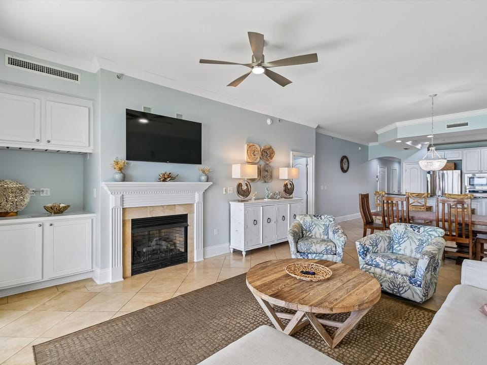 TV and multimedia, Living room, Seating area, Dining area, fireplace, furniture, air conditioner