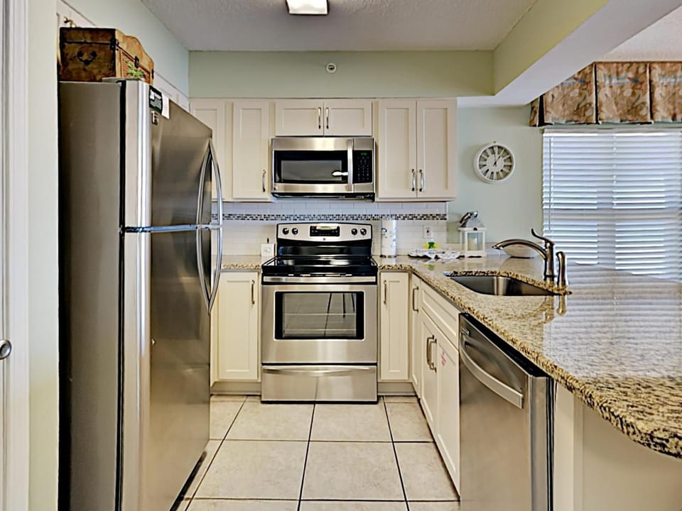 Kitchen or kitchenette, microwave, oven, stove, kitchen