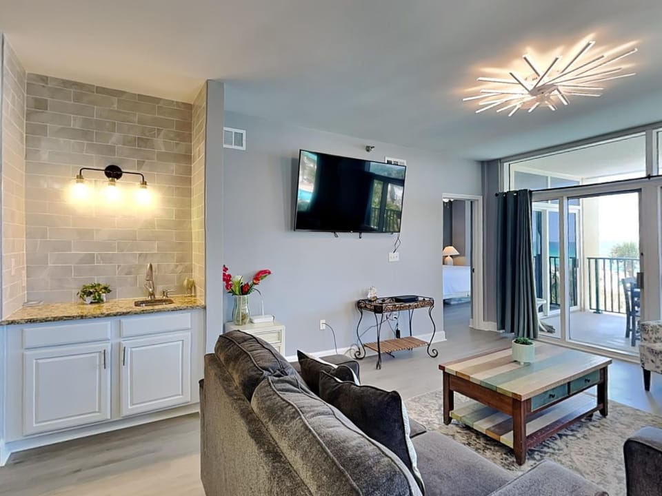 TV and multimedia, Balcony/Terrace, Living room, Seating area, furniture, air conditioner