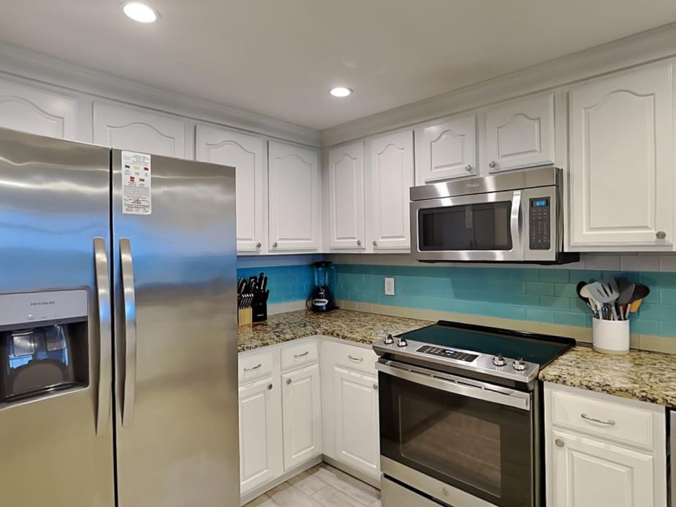 Kitchen or kitchenette, microwave, oven, stove, kitchen