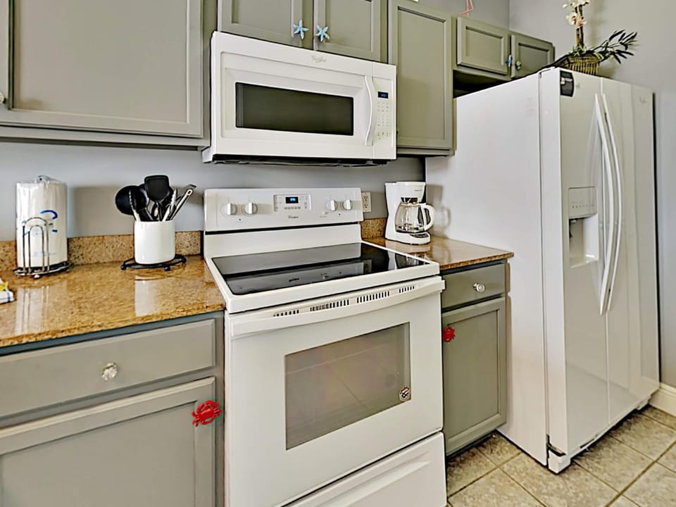 Kitchen or kitchenette, microwave, oven, stove, kitchen