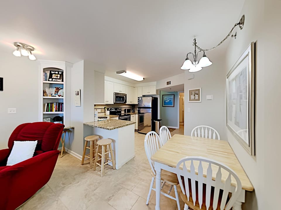 Kitchen or kitchenette, Living room, Seating area, Dining area, furniture, oven, stove, air conditioner