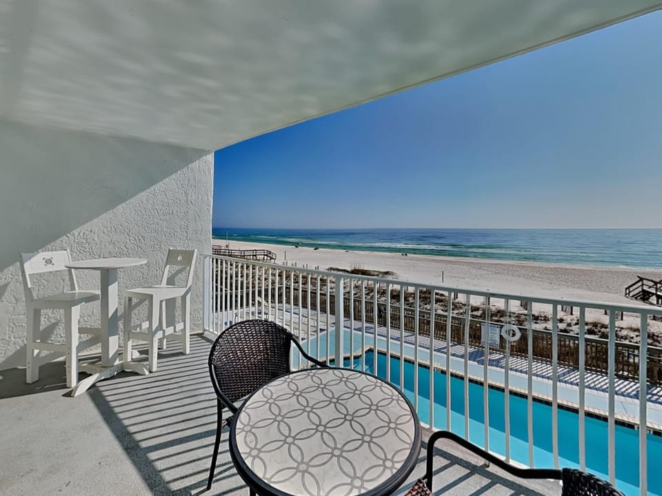 Balcony/Terrace, Seating area, Beach, Pool view, Sea view, Swimming pool