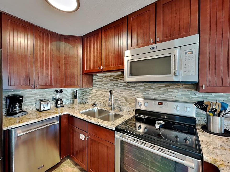 Kitchen or kitchenette, microwave, stove, toaster, kitchen