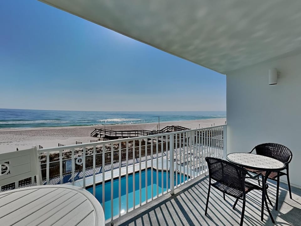 Balcony/Terrace, Seating area, Beach, Pool view, Sea view, Swimming pool
