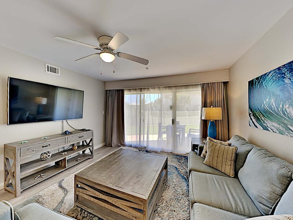 TV and multimedia, Balcony/Terrace, Living room, Seating area, furniture, air conditioner