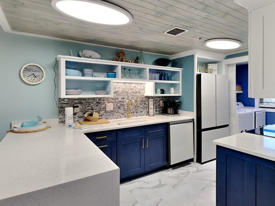 Kitchen or kitchenette, dishwasher, furniture, microwave, kitchen