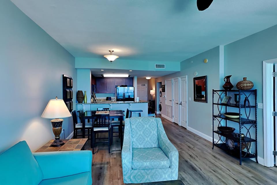 Kitchen or kitchenette, Living room, Seating area, Dining area, furniture, laundry, washing machine, air conditioner