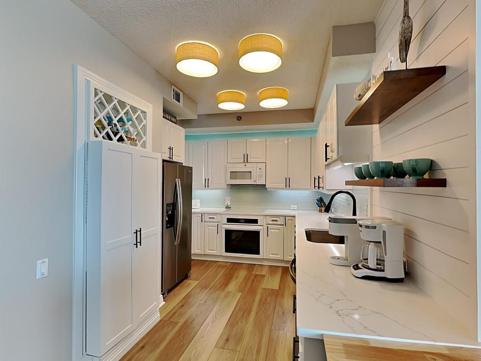 Kitchen or kitchenette, furniture, microwave, oven, toaster, kitchen