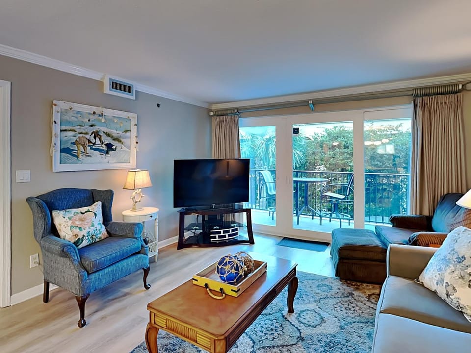 TV and multimedia, Balcony/Terrace, Living room, Seating area, furniture, air conditioner