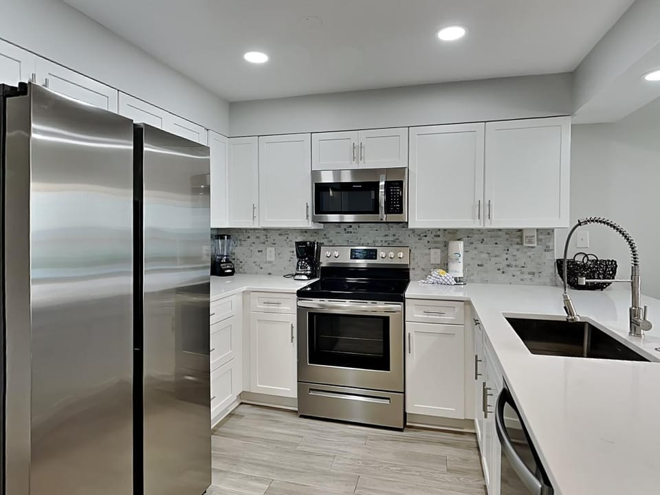 Kitchen or kitchenette, microwave, oven, stove, kitchen