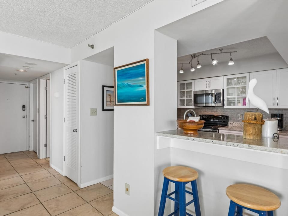 Kitchen or kitchenette, Seating area, furniture, microwave, stove